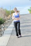 Skinny blonde Emilee exposes her tits while jogging and gets naked at home