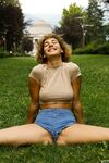 Slim amateur Sylvia Belotti poses in tight denim shorts & a crop top outdoors